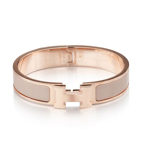 hermes rose gold clic bracelet.